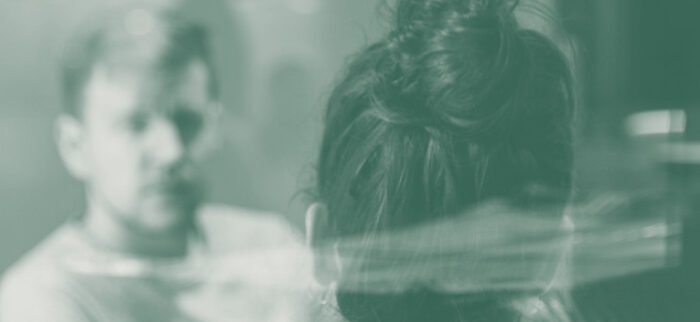 Ein Mann und eine Frau in einer Business Coaching Situation.